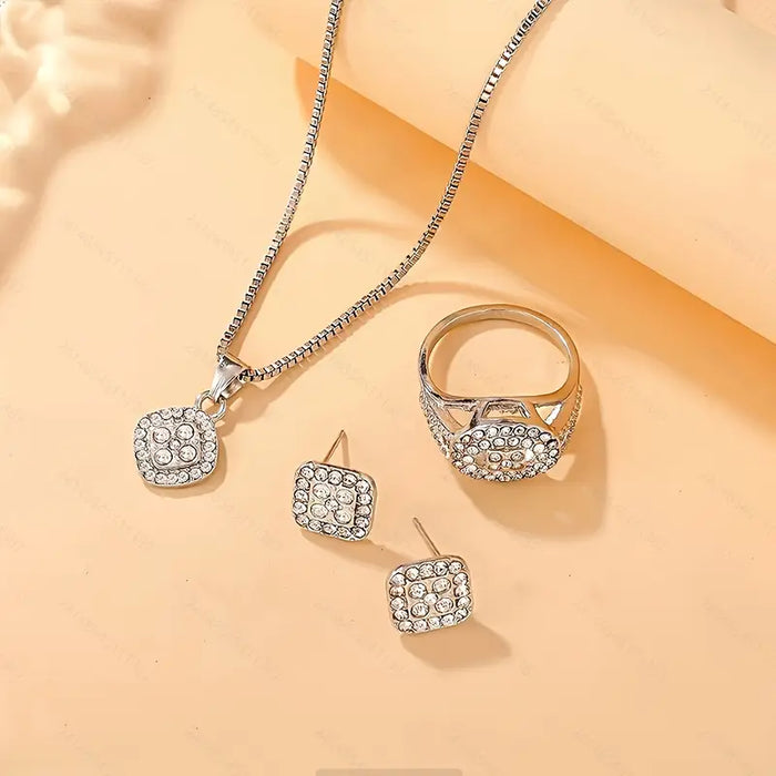 Conjunto de collar con colgantes, aretes y anillo elegantes de acero inoxidable adecuados para uso diario