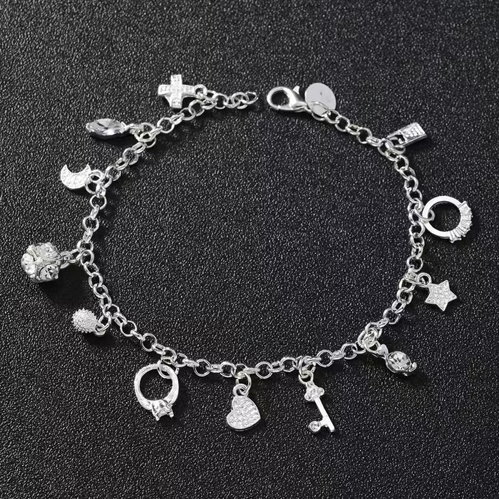 Pulsera con colgantes plateados de 13pcs, elegante con dijes como cruces, estrellas y llaves