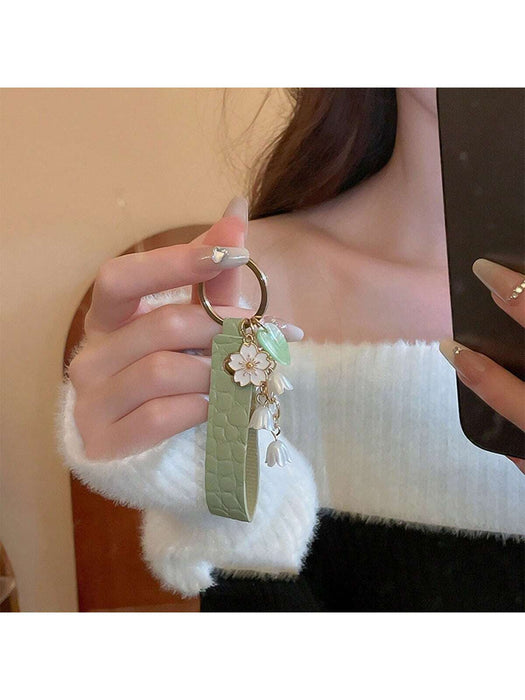 1 llavero estilo Mori con un lindo lirio blanco del valle y cadena dorada - Quierox - Tienda Online