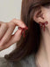1 par de aretes con diseño de lazo, color borgoña para toda ocasion - Quierox - Tienda Online