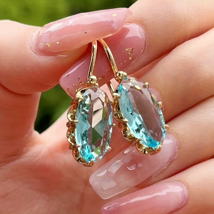 Aretes ovalados con un montaje de garra, perfectos para bodas de novias