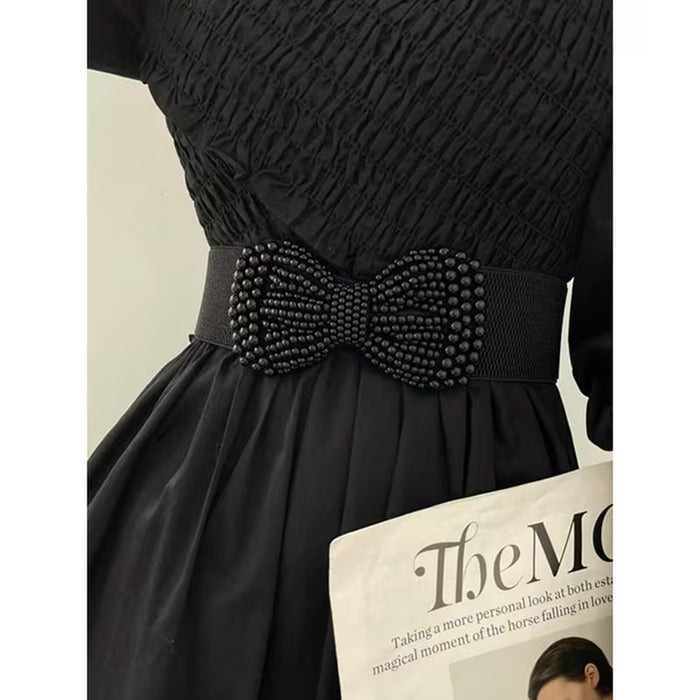 1 cinturón elástico  con lazo adecuado para vestidos, camisas, blusas y faldas