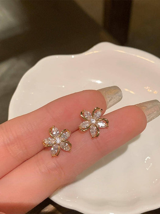 SHEIN 1 par de pendientes de botón con flor de circonita transparente