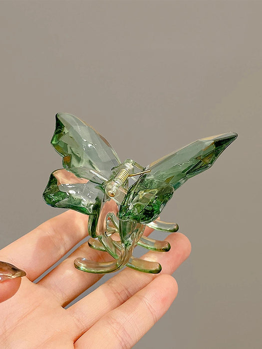 SHEIN 2 piezas Clips para el cabello de mujer con estilo de mariposa