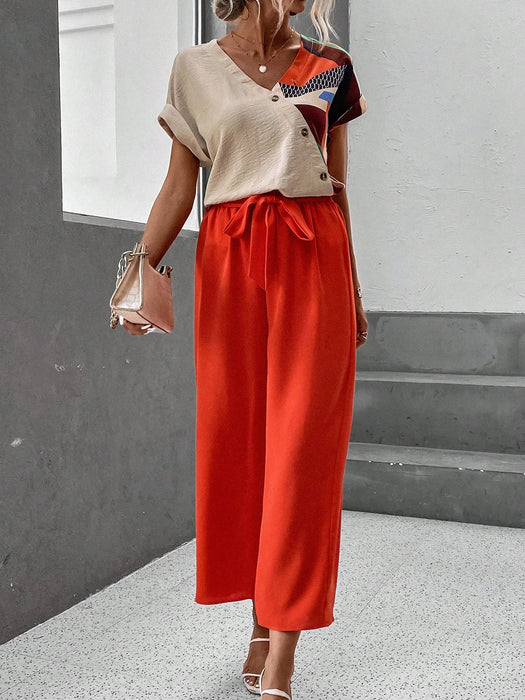 SHEIN LUNE Top de manga murciélago con estampado geométrico y pantalones de pernera ancha