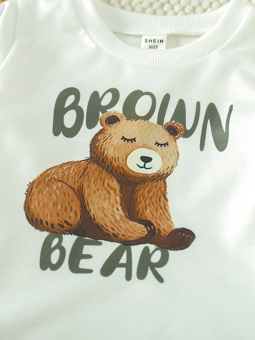 Shein Playful Pals Conjunto para niño de camiseta con ribete contrastante estampado de dibujos animados y pantalones