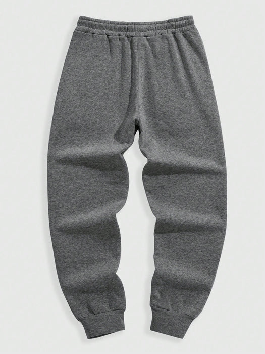 SHEIN Manfinity Dauomo Pantalones jogger con cordón y dobladillo elástico para hombres