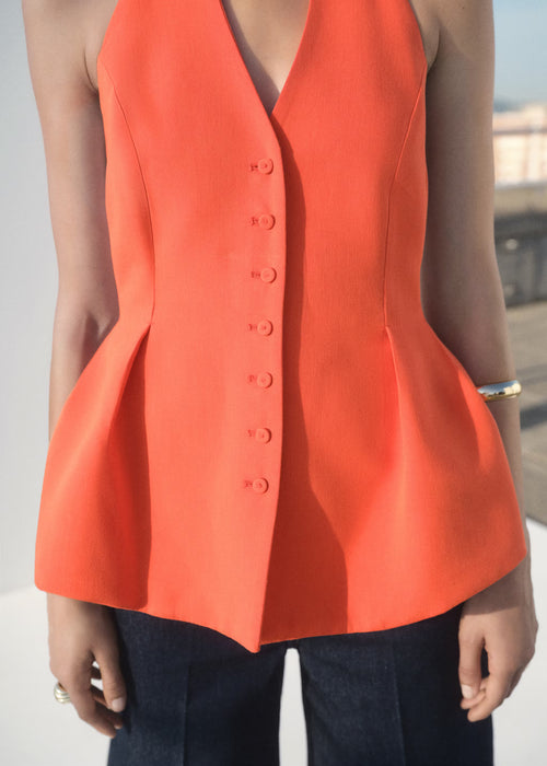 Chaleco peplum cuello halter