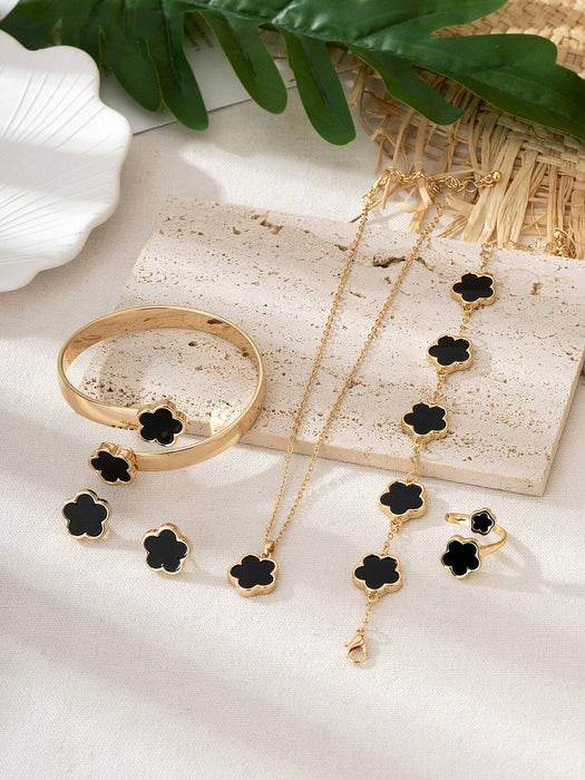 SHEIN 1 juego de joyas para mujer. Incluye 1 collar con colgante de trébol, 1 pulsera..