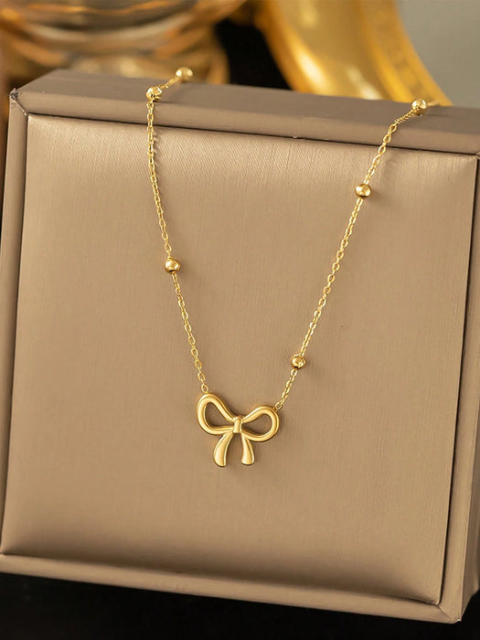 SHEIN 1 pieza Collar con colgante de lazo de acero inoxidable dorado