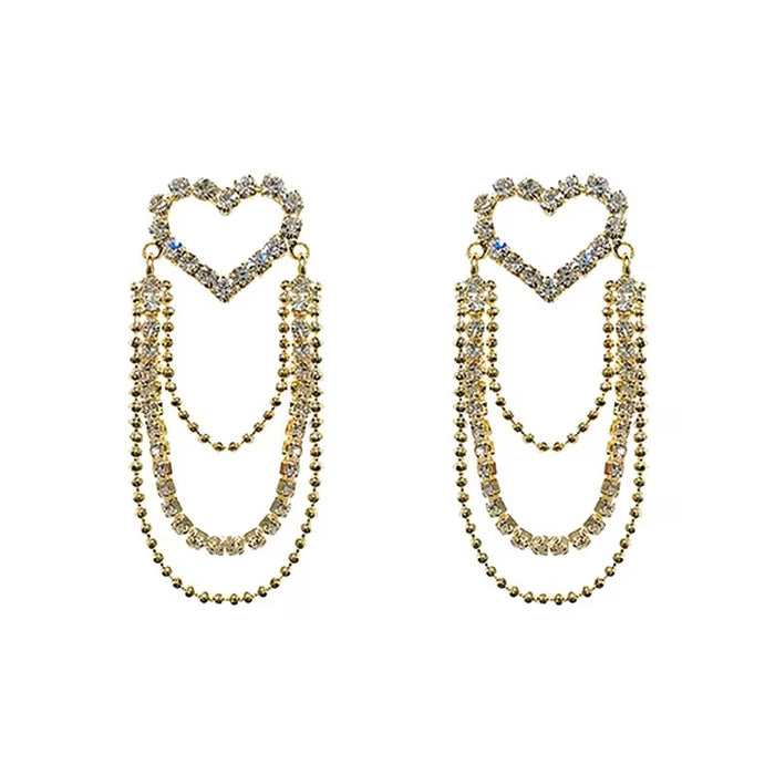 1 par de exquisitos y elegantes aretes de corazón hueco con borlas