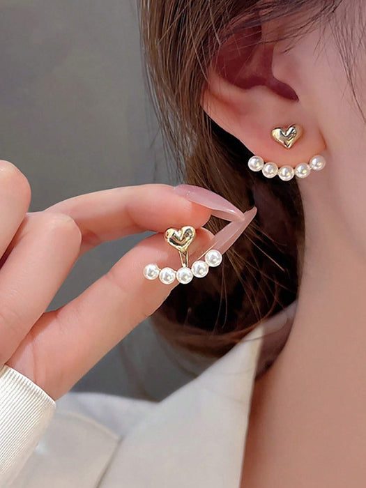 1 par de aretes de perlas falsas en forma de corazón