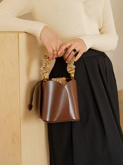 Bolso y bandolera retro para mujer de cubo con cordón de pétalo de hombro