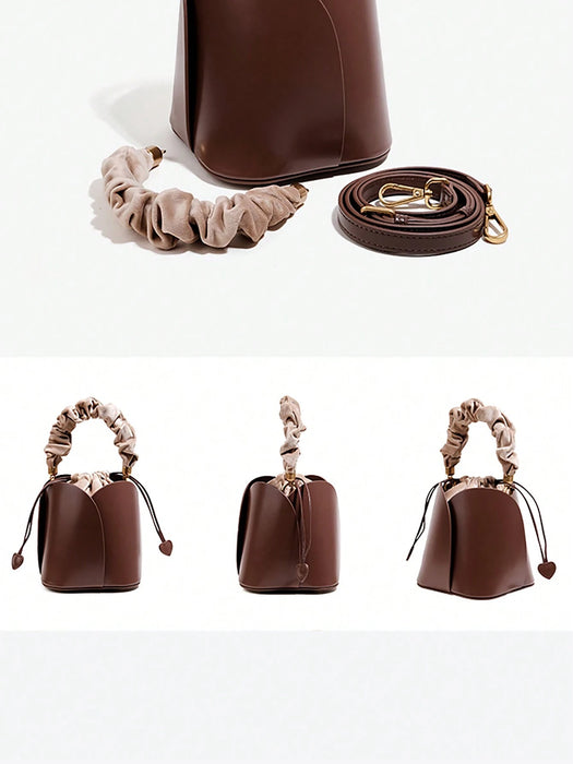 Bolso y bandolera retro para mujer de cubo con cordón de pétalo de hombro
