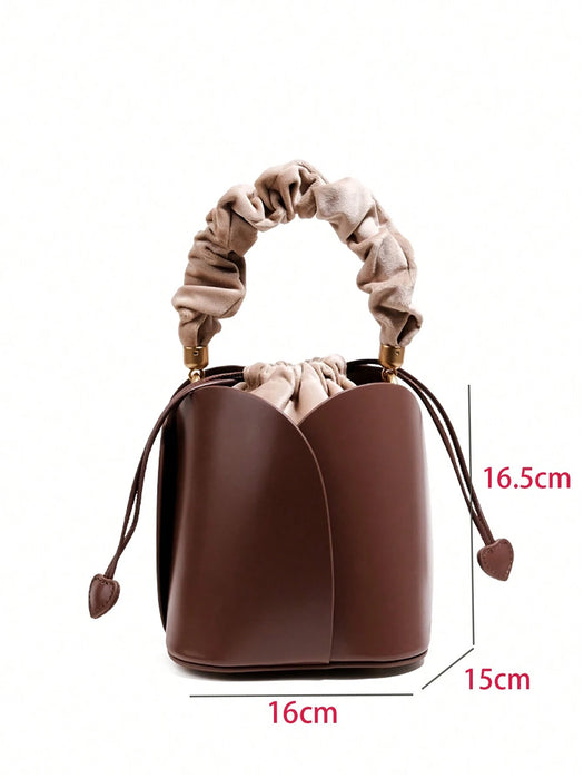 Bolso y bandolera retro para mujer de cubo con cordón de pétalo de hombro