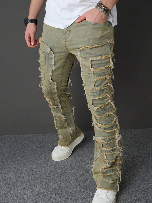 Jeans de mezclilla desgastados y destdñitos de moda para hombre