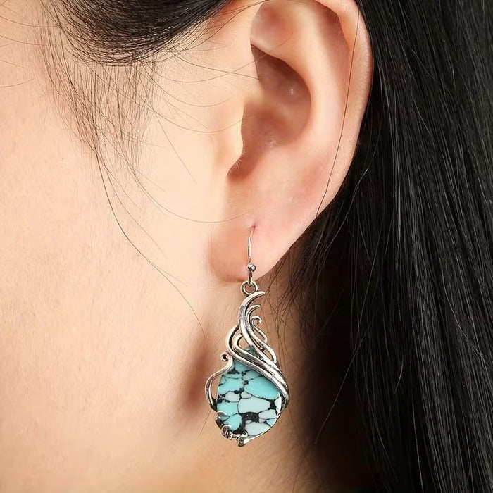 1 par de pendientes colgantes huecos exquisitos y elegantes