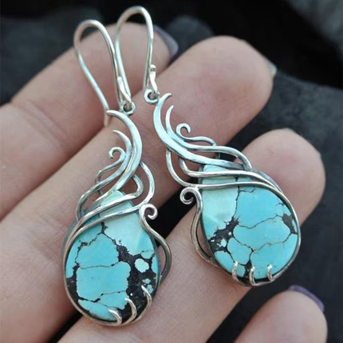 1 par de pendientes colgantes huecos exquisitos y elegantes