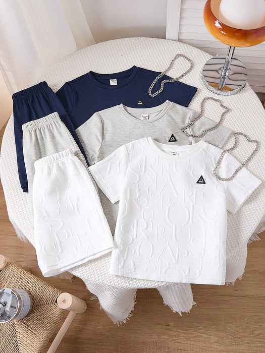 SHEIN Conjunto de 6 piezas de camiseta de manga corta y pantalón corto de tela texturizada para niño
