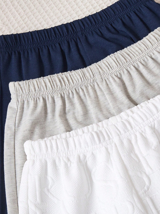SHEIN Conjunto de 6 piezas de camiseta de manga corta y pantalón corto de tela texturizada para niño