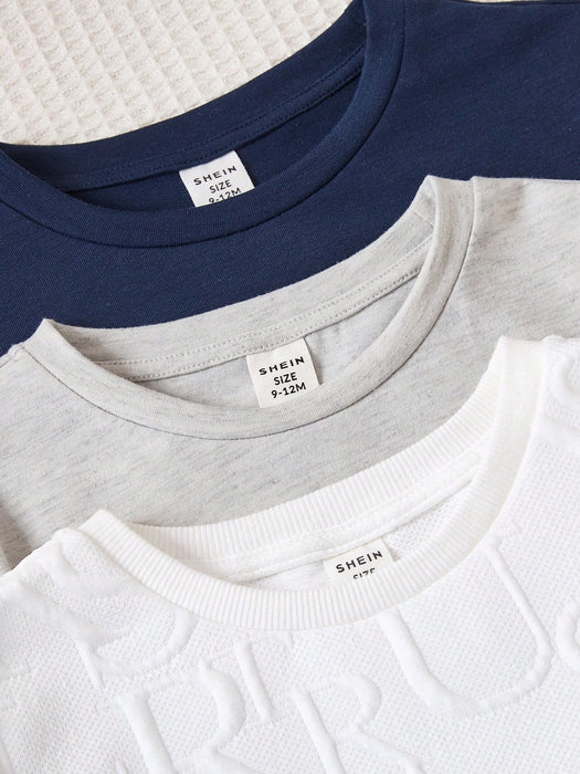 SHEIN Conjunto de 6 piezas de camiseta de manga corta y pantalón corto de tela texturizada para niño