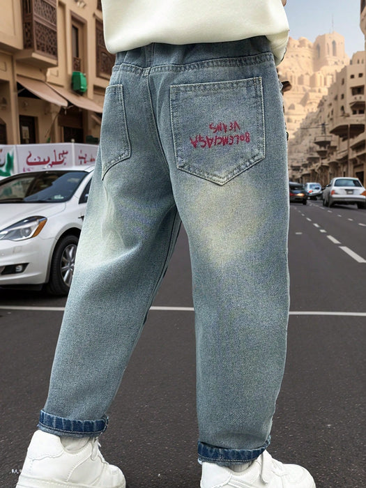 Shein Pantalones vaqueros desgastados bordados con bolsillos rotos