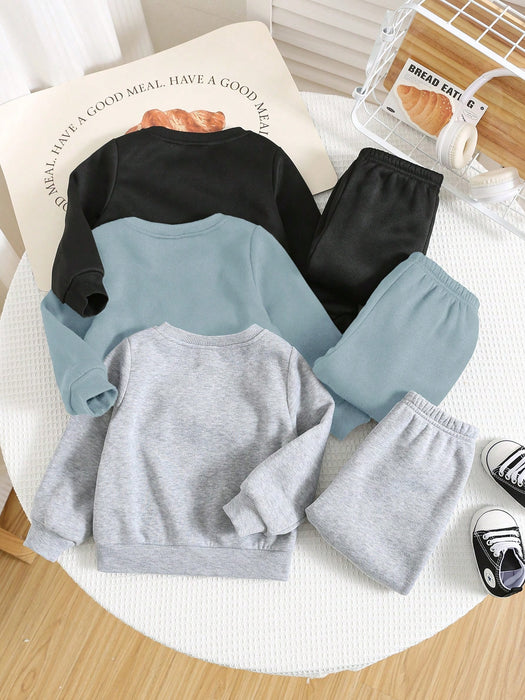 Shein Set de 3 piezas de sudadera con capucha y pantalones jogger de ajuste holgado para niño
