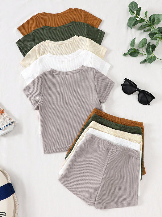 Shein Playful Pals Conjunto de 5 piezas para niños camisetas de manga corta de punto texturizado y pantalones cortos