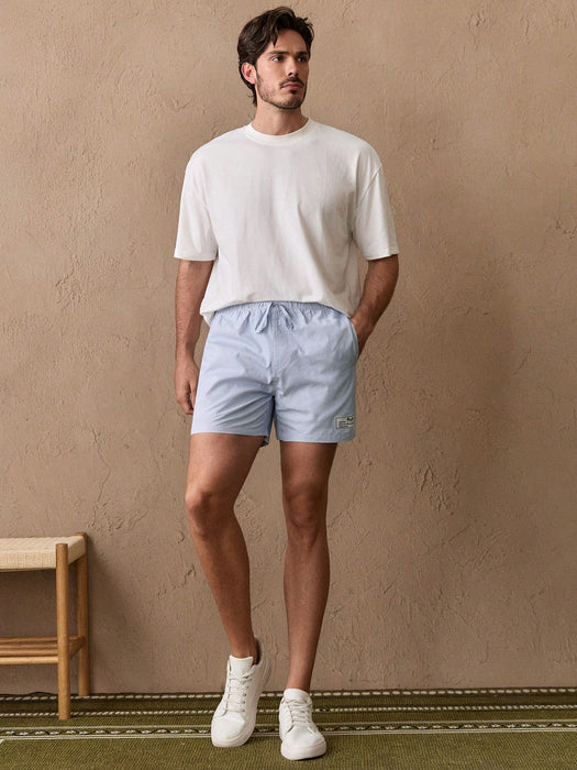 SHEIN Mainfolk Pantalones cortos casuales de hombre con rayas verticales tejidas
