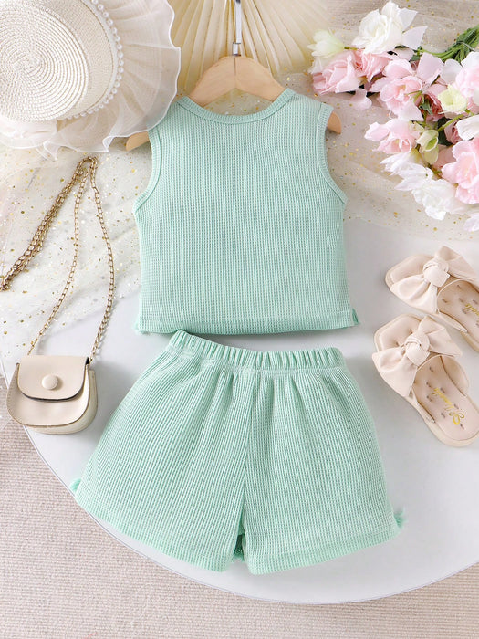 SHEIN Vintaside Kids Conjunto de 2 piezas de top sin mangas y shorts de crochet con estampado floral tipo gofre