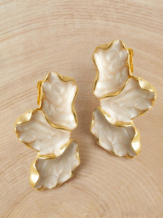 Shein Pendientes elegantes de flores Glizzene para mujer