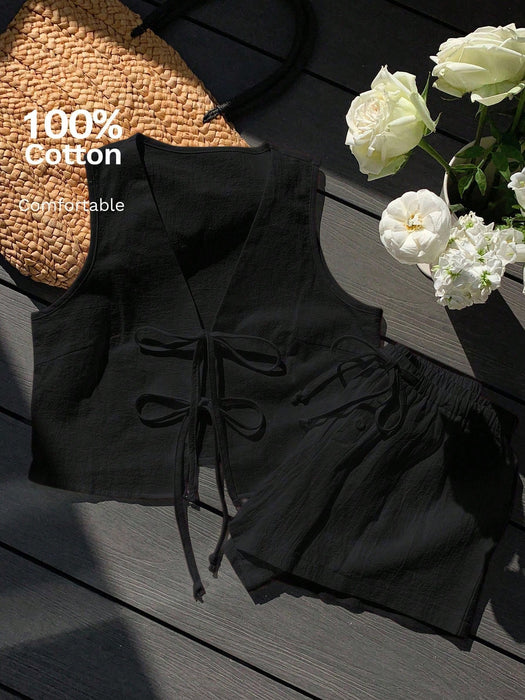 Shein Comfortcana Conjunto casual para mujer: top sin mangas anudado de color liso y shorts