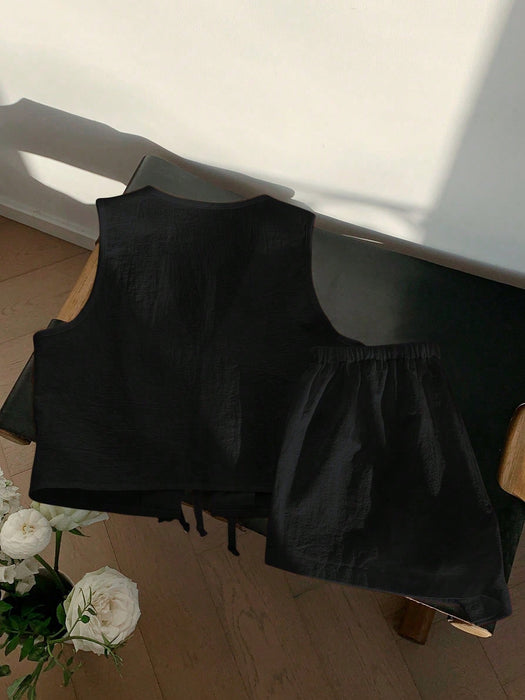 Shein Comfortcana Conjunto casual para mujer: top sin mangas anudado de color liso y shorts