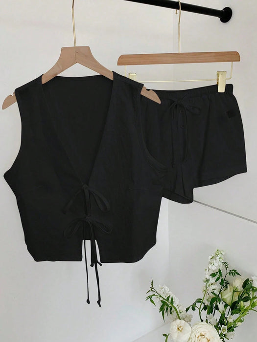 Shein Comfortcana Conjunto casual para mujer: top sin mangas anudado de color liso y shorts