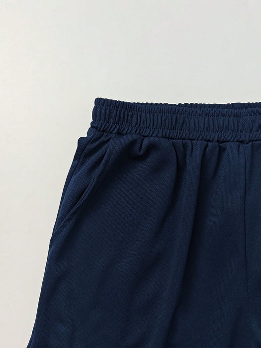 SHEIN Manfinity Dauomo Conjunto de polo para hombre, color liso con ribete en contraste y pantalones cortos
