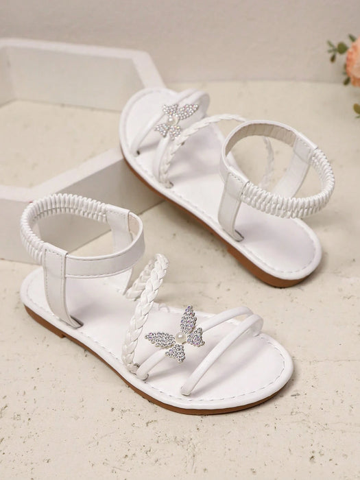 Sandalias planas blancas para niñas con decoración de perlas brillantes y mariposas