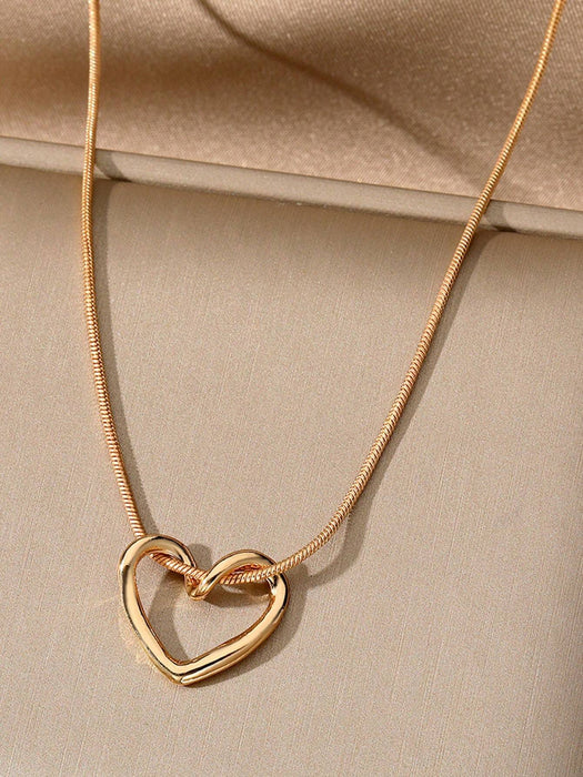 SHEIN 1 pieza Collar con colgante de corazón hueco para mujeres