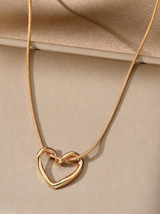 SHEIN 1 pieza Collar con colgante de corazón hueco para mujeres