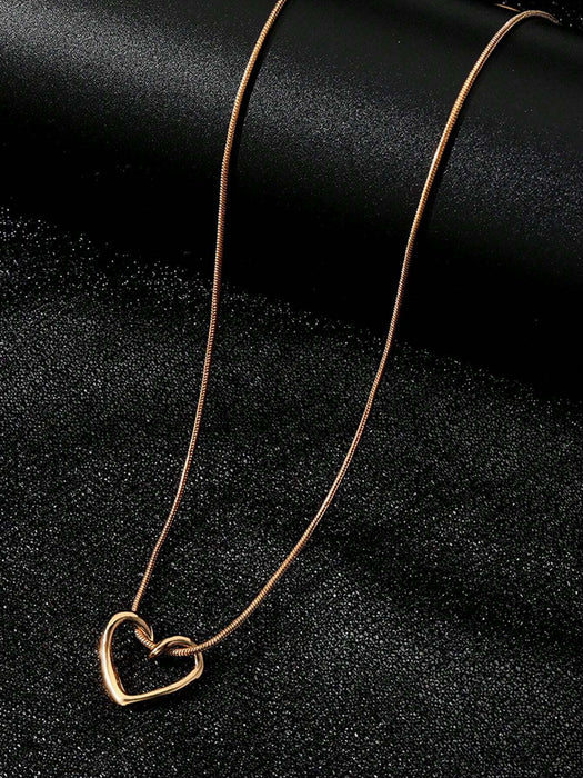 SHEIN 1 pieza Collar con colgante de corazón hueco para mujeres