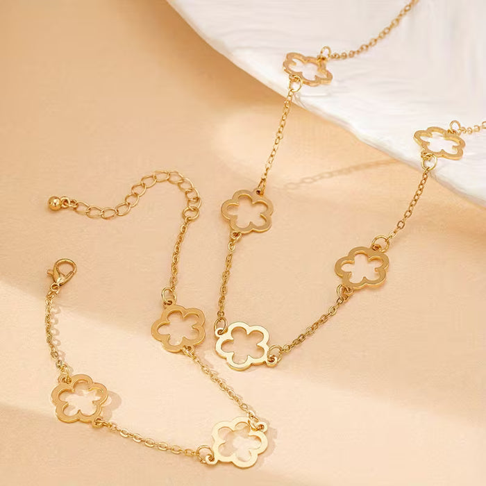 Collar y pulsera de trébol hueco para mujer