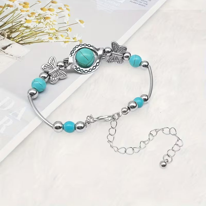 Pulsera turquesa vintage hecha a mano, cuentas de la suerte de mariposa