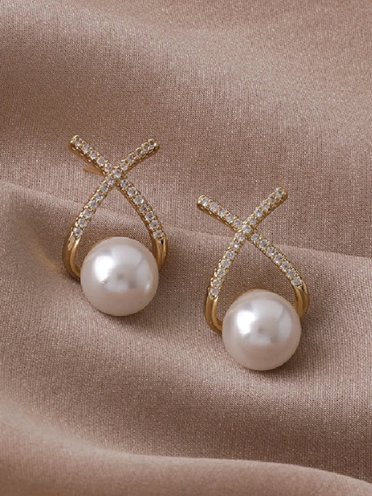 SHEIN 1 par de pendientes de botón cruzados con diamantes de imitación y perlas de imitación.