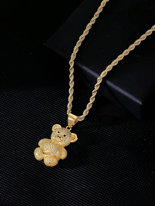 1 collar con colgante de osito de cobre en tono dorado y circonita cúbica.