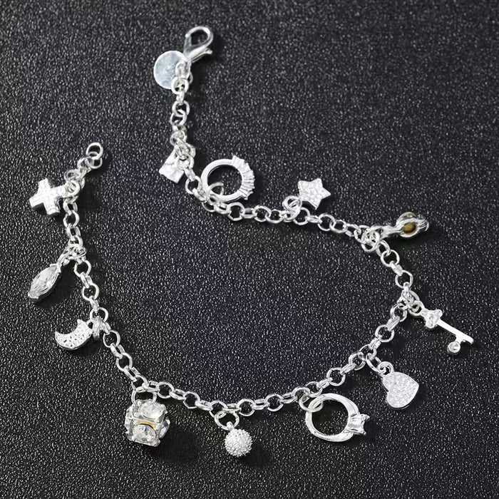 Pulsera con colgantes plateados de 13pcs, elegante con dijes como cruces, estrellas y llaves