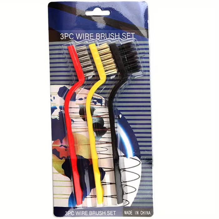 Un cepillo de alambre para limpiar estufas y eliminar manchas de grasa, junto con varios cepillos de limpieza
