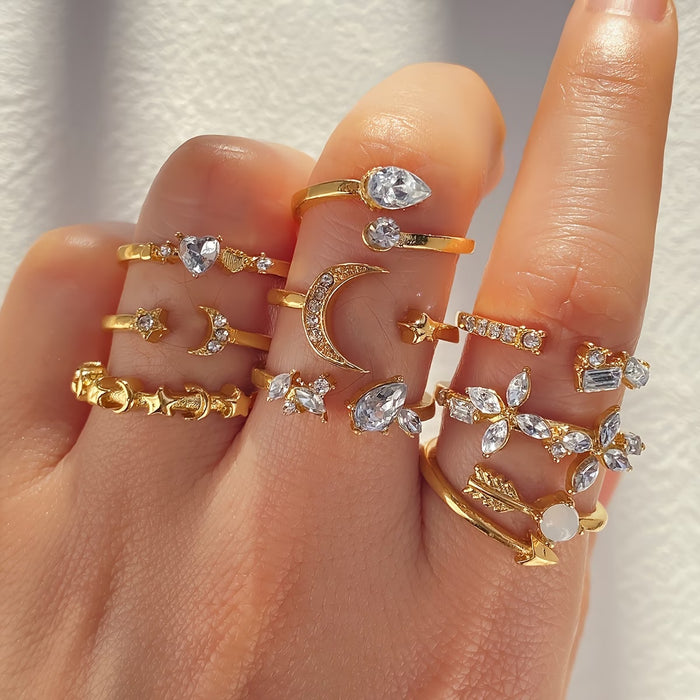 Conjunto de 9 anillos con forma de lágrima adornados con diamantes de imitación con estrellas y lunas