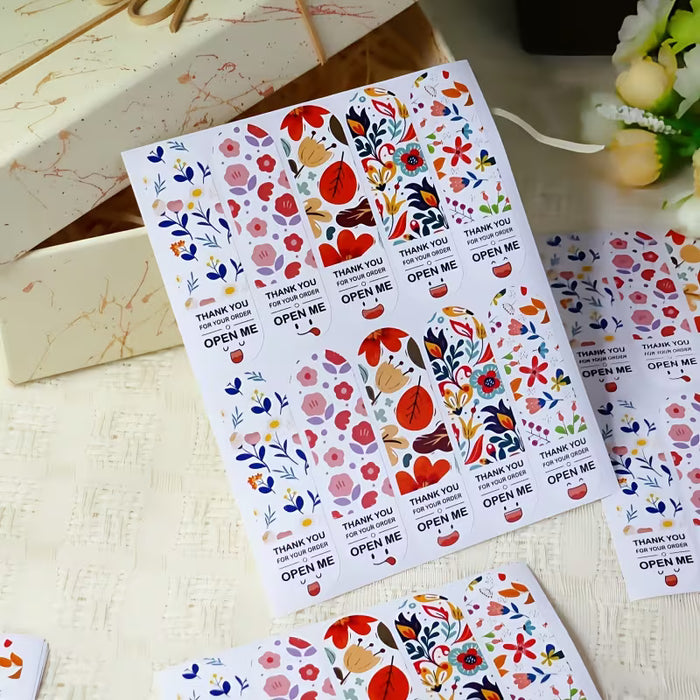 100 Pegatinas de Caja de Regalo "Gracias por Tu Pedido" - Diseño con Caritas Sonrientes