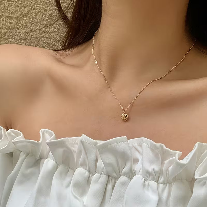 Colgante de Corazón con Enlace Entrelazado, Joyería Duradera