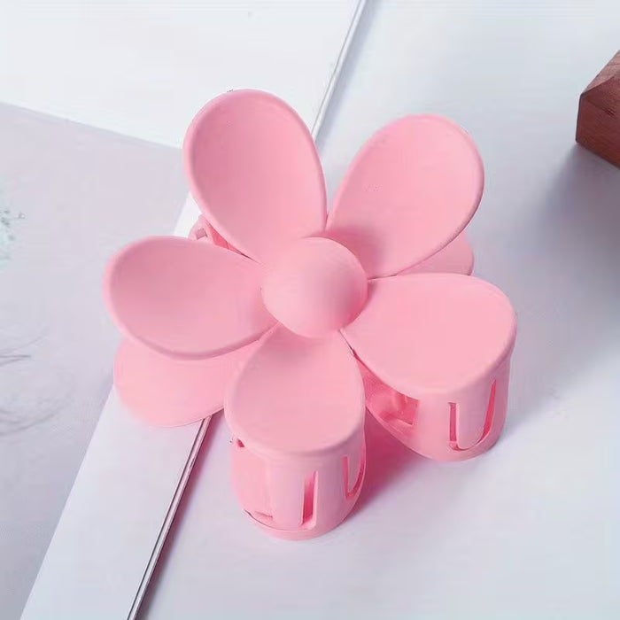 Clip con pinza para el cabello con forma de flor de color rosa