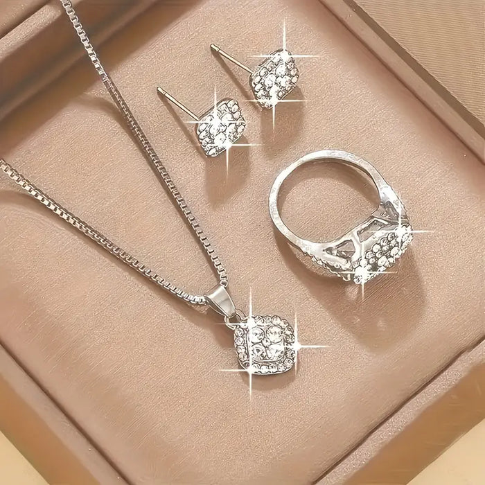 Conjunto de collar con colgantes, aretes y anillo elegantes de acero inoxidable adecuados para uso diario